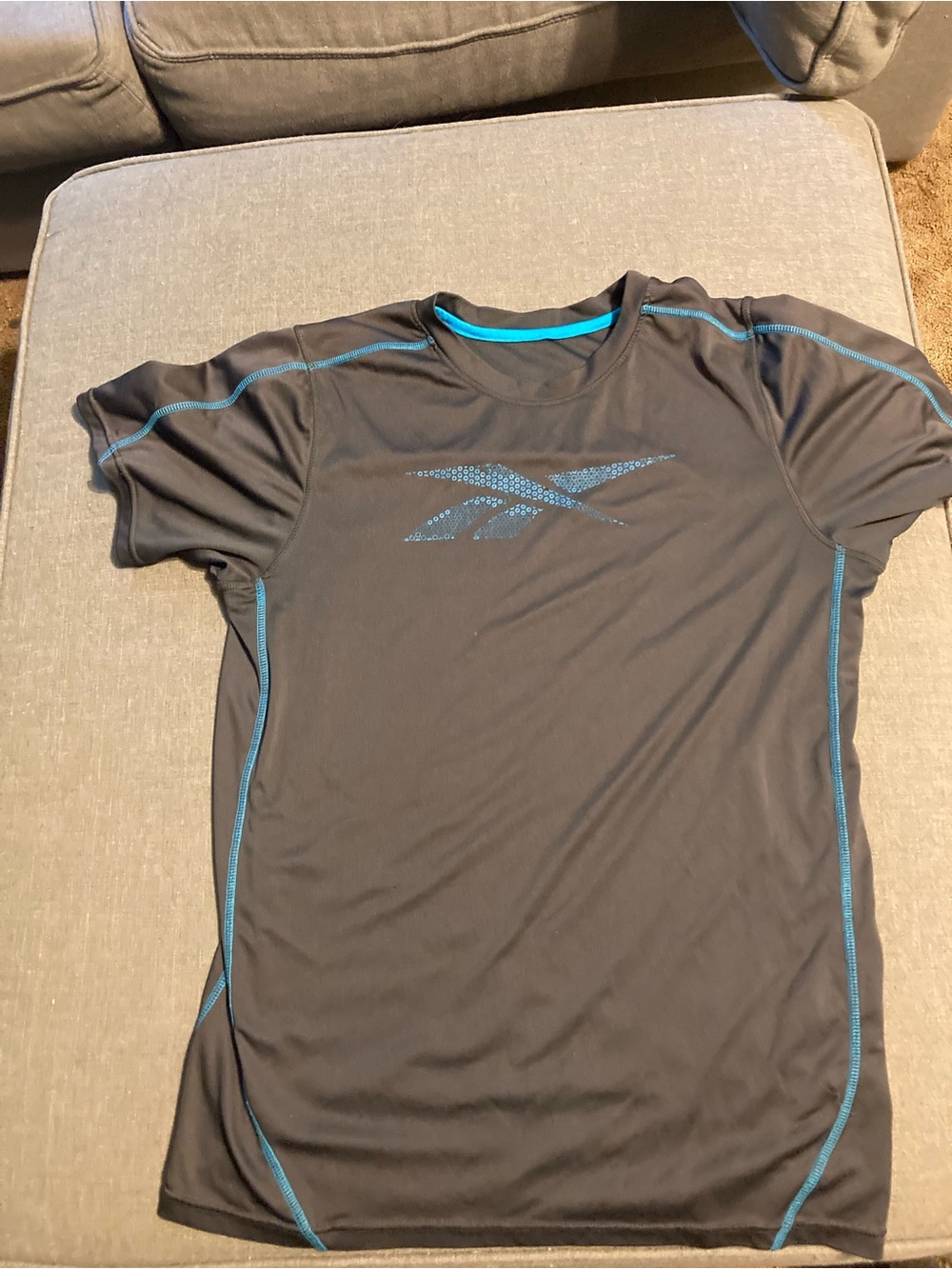 Reebok Black Tee with Teal Stitching and Logo